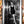 Vintage Aufzug Poster – Schwarz Weiß Fotokunst mit Abendkleid